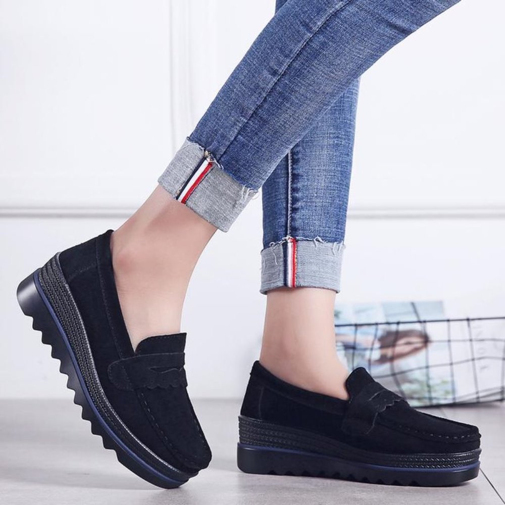 Black platform loafers